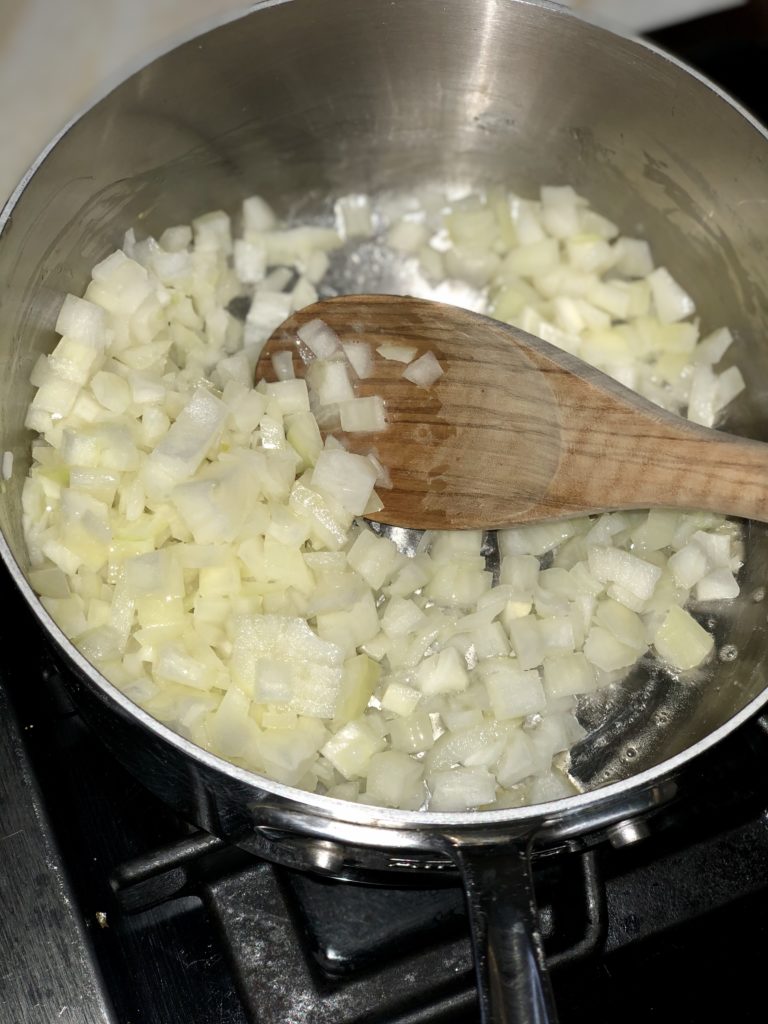 Sauteed onion and garlic for easy homemade pasta sauce.