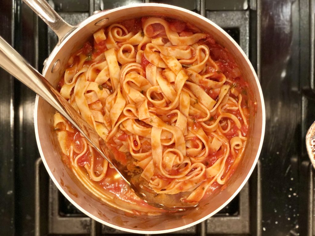 Easy homemade pasta sauce on gluten free noodles.